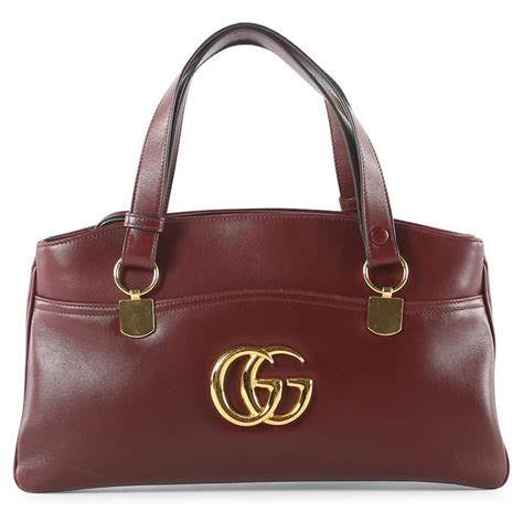 burgundy gucci purse